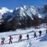 Ciaspolata sulla neve in Trentino nella Val di Sole