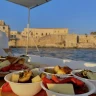 Tour in barca dell'Isola di Ortigia al Tramonto con Aperitivo